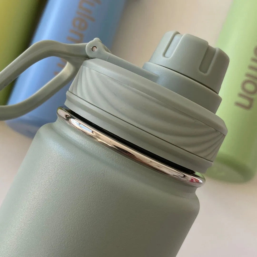 Lulu Insulated Sports Water Bottle: 710ml - Stainless Steel & Pure Titanium - Vacuum Insulated, Leakproof, and Portable